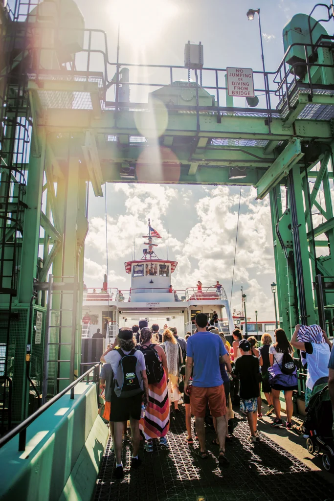 Portland-bound passengers file onto the Peaks Island ferry. 