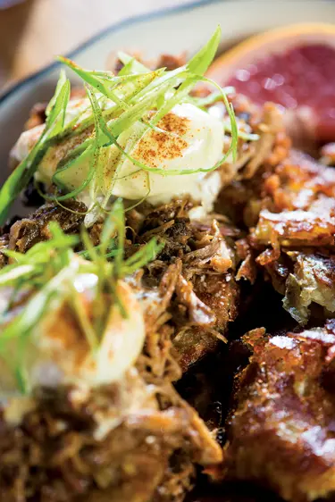 Eggs Benedict with Pulled Pork and Fried Green Tomatoes at Hot Suppa, in Portland, Maine