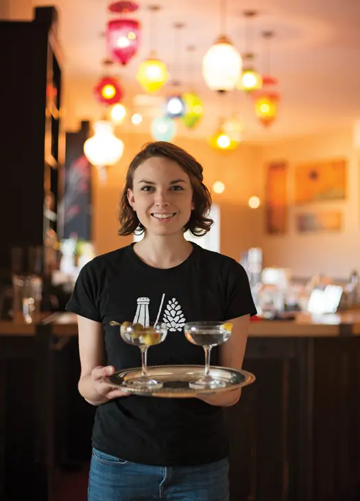 Waitress serving drinks