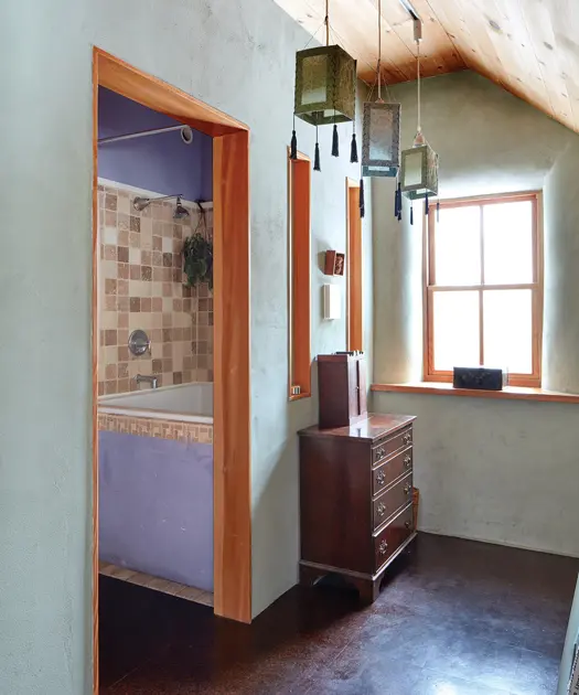 Hallway with purple bathroom