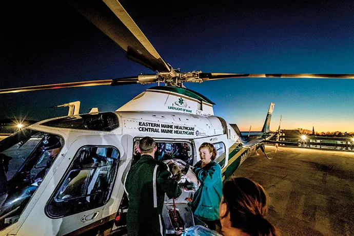 The team arrives with a patient at Eastern Maine Medical Center.