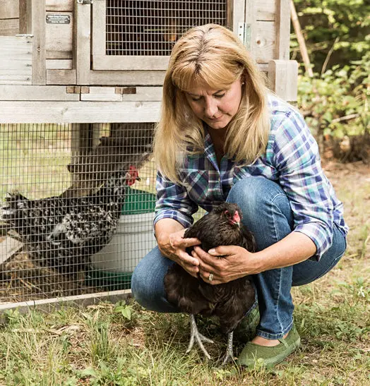 lisa holding chicken