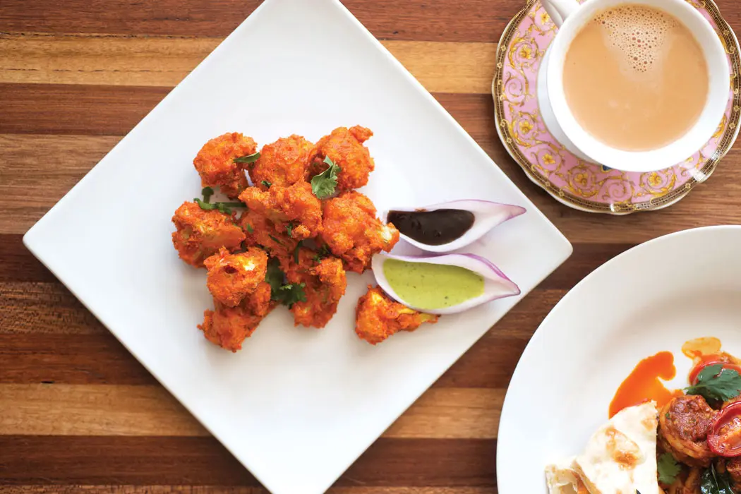 “Cauliflower 65,” fried cauliflower with chutneys.