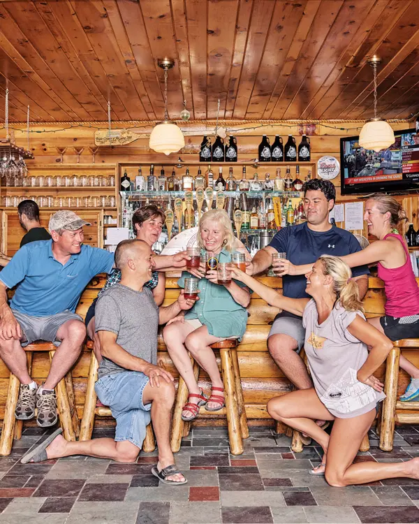 group cheering in a bar