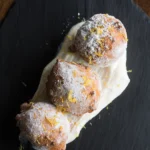 tarragon, and pecorino; zeppoli with long-pepper sugar, lemon, and whipped ricotta.