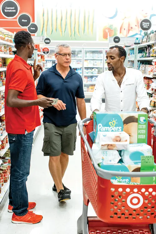 beacon of welcome Mark, Markos, and Tariku shopping.