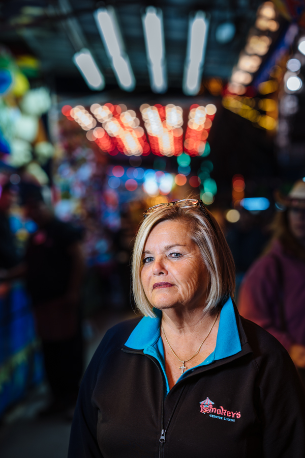 Jeanette Gilmore, Smokey’s impresaria. Facing page: A carnival worker mans the Ferris wheel on the opening night of the Fryeburg Fair.