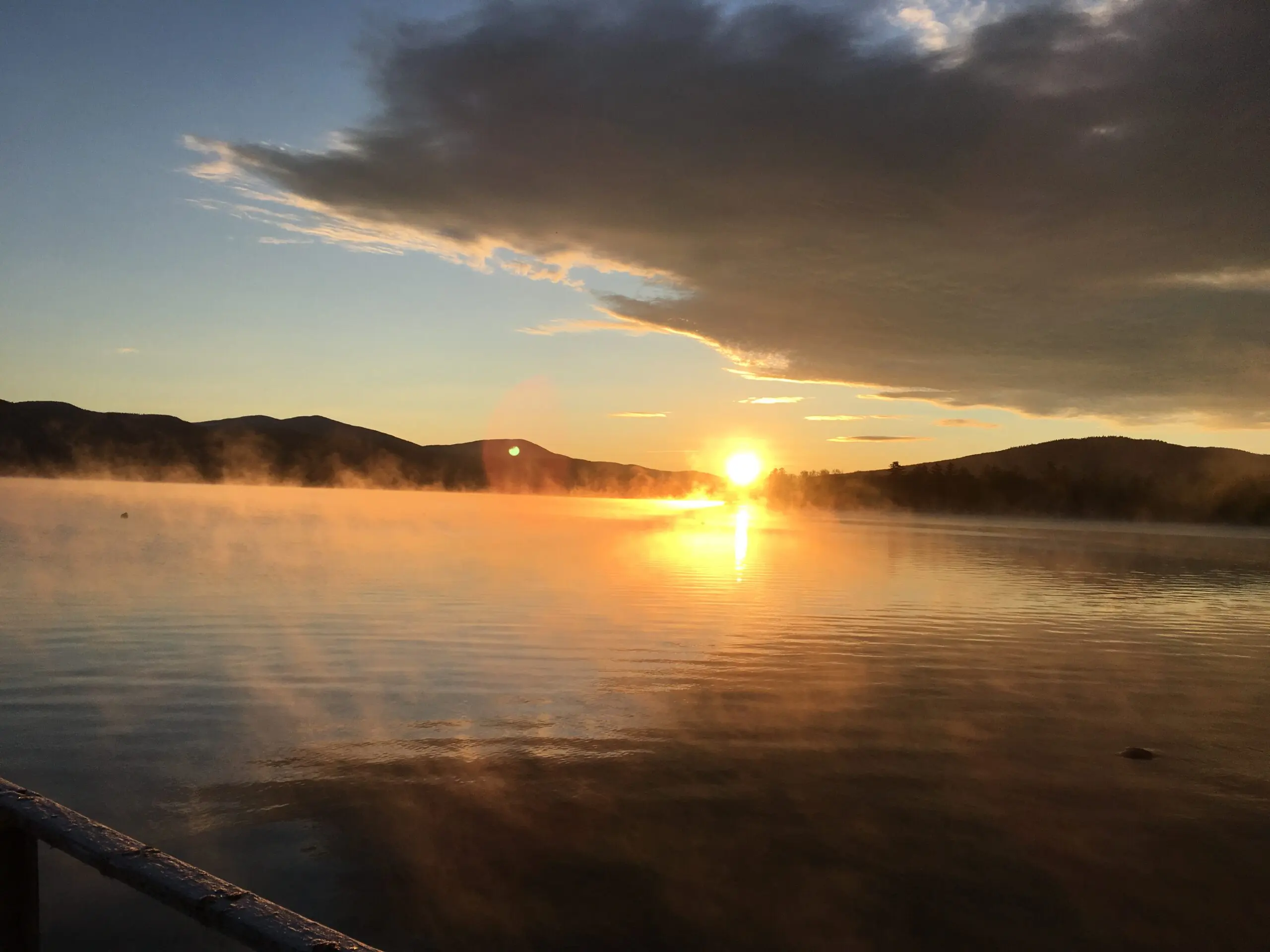 Sunrise at Lower Richardson Lake, Maine. Yes please use!! My last name is Vincunas my instagram is @cyndimariev. My brother and his wife Robin and Terry Spencer just bought Lakewood Camps on the lake that’s where the photo was taken. We were up there for hunting season some hunters were staying there and we were cooking for them. It’s a beautiful place and has been a fly fishing camp since 1853.