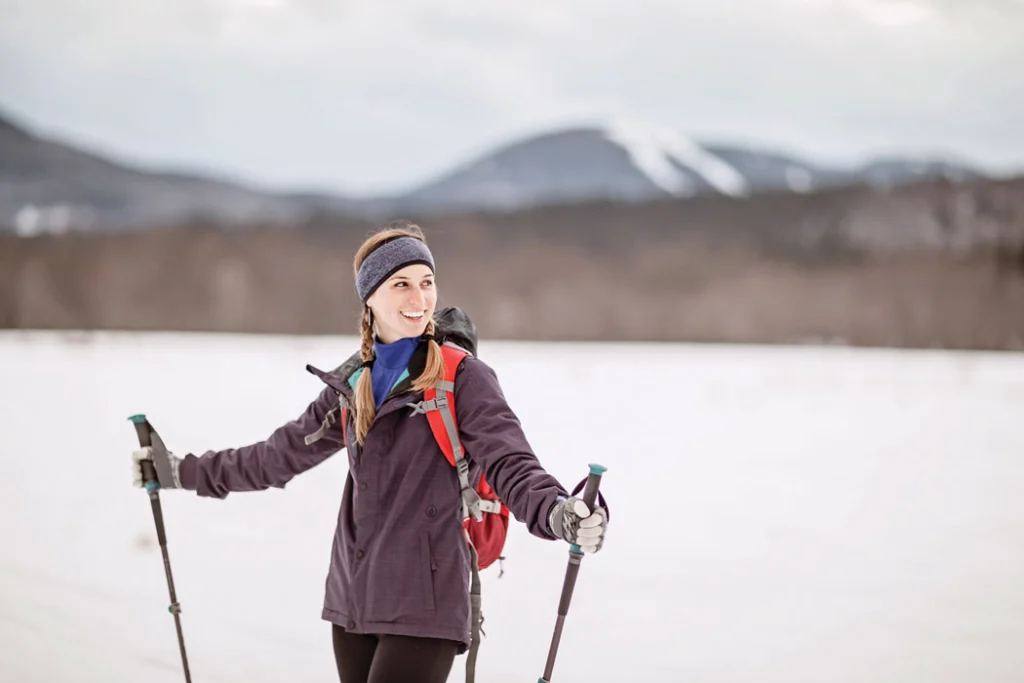 The Mahoosuc Mountain skyline looms behind the trails at Carter’s in Bethel, Maine
