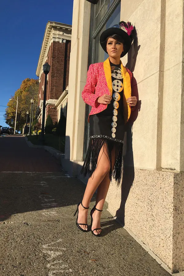 Dalayun Demmons in traditionally adorned haute couture