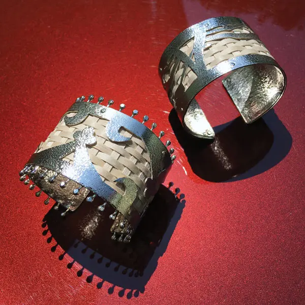 Silver and ash cuffs marry traditonal basketry with metalwork.
