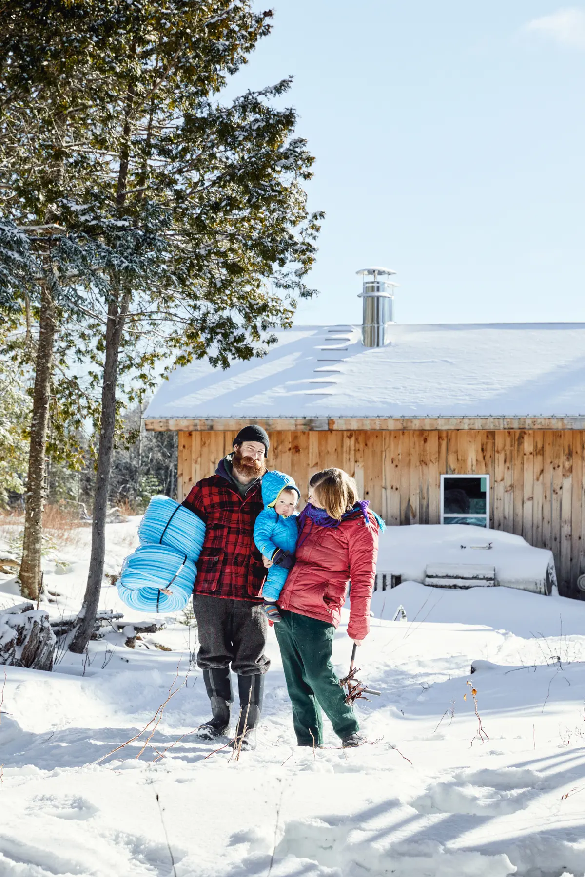 VJ Guarino, Carrie Braman, and baby Quinn at their Jackman sugar shack. VJ Guarino, Carrie Braman, and baby Quinn at their Jackman sugar shack.