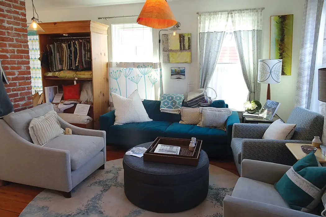 Amy Dutton’s lampshades, pillows, and curtains in her homey showroom.