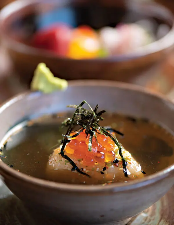 Age ochazuke, a fried rice ball in fish broth, topped with ikura (salmon roe).