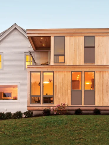 a 19th-century main house and detached guesthouse — with a new addition