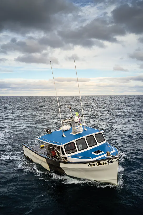 Sea Glass, a 45-foot, Canadian-made Dickson boat, lists to one side in high seas