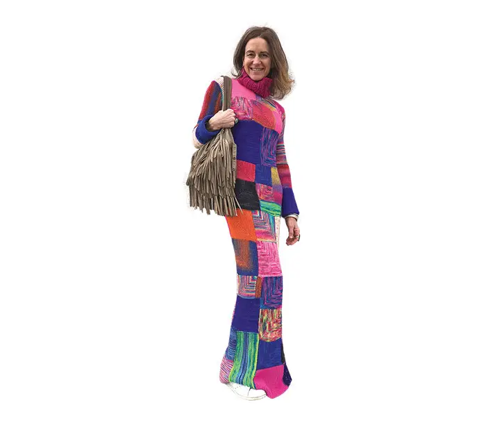 Sara Brand-New wearing a knit patchwork turtleneck dress