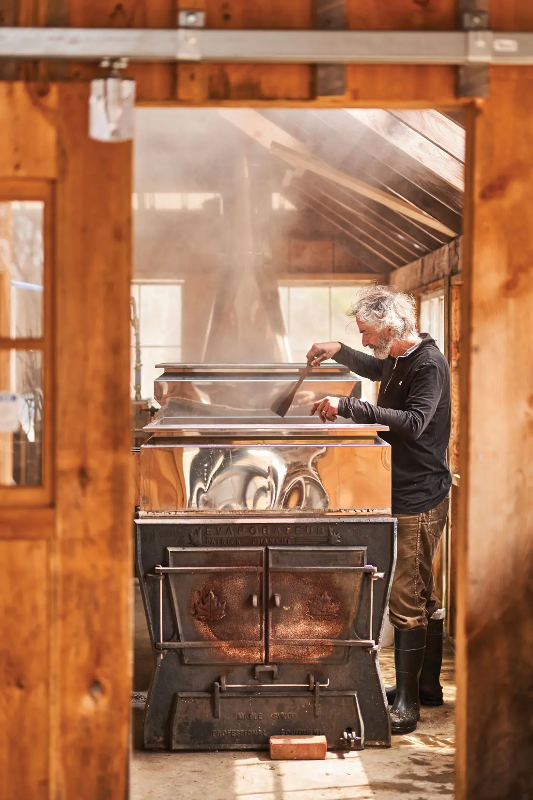 During the spring harvest, Michael Romanyshyn boils sap in a wood-fired evaporator and sells his Temple Tappers brand of birch syrup to specialty grocers and restaurants.