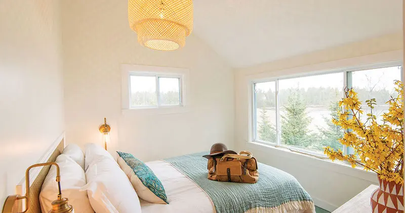 A simple, stylish cottage room at Aragosta at Goose Cove.