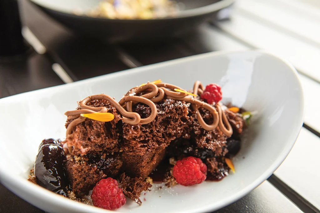 Bourbon chocolate cake with cherry jam and coffee cremeux at Gross