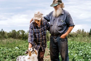Pumpkin aficionados Tom Roberts and Lois Labbe at Snakeroot Organic Farm.