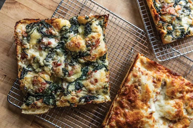 Focaccia with greens, ham, and béchamel from Senza Scarpe