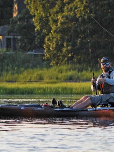 Mike Baker fishing from his electric-powered kayak