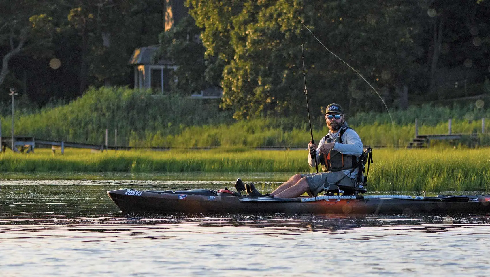 Mike Baker fishing from his electric-powered kayak