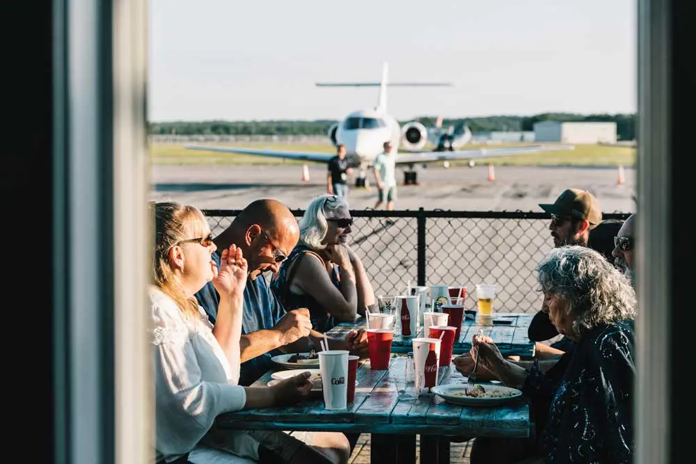 Wheels up! Meals at Sanford’s Pilot’s Cove Cafe come with a view of the tarmac.