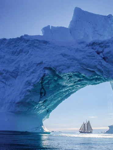 In 1991, in Disko Bay, on Greenland’s west coast, the schooner Bowdoin passed an iceberg with a dramatic arch.