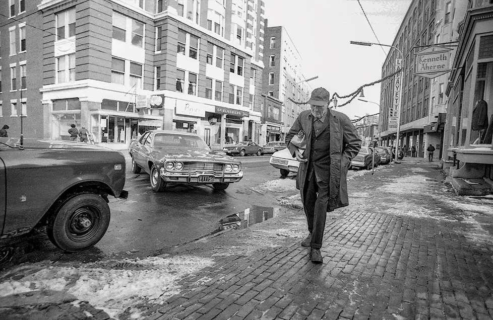 Passing Kenneth Aherne Tailor Shop, on Congress, photographed by John Duncan