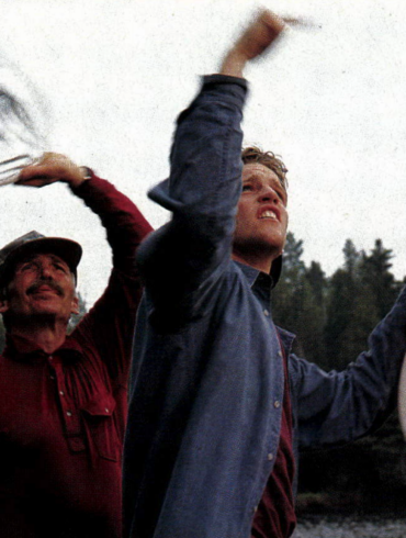 Hoping for an early rescue, the author and the Outward Bounder wave anxiously at their charter plane.
