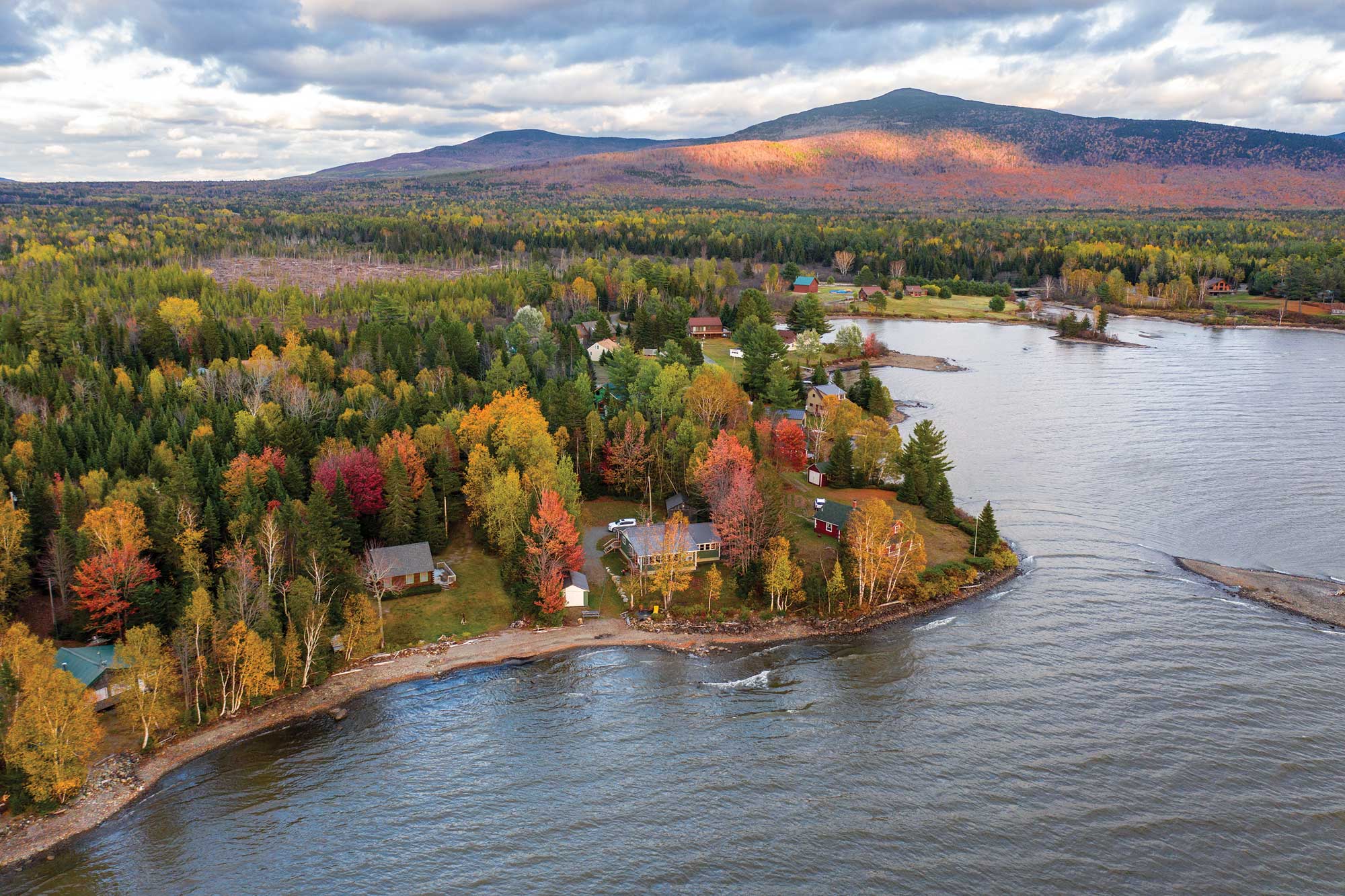 The few shoreside houses of Lily Bay Township.