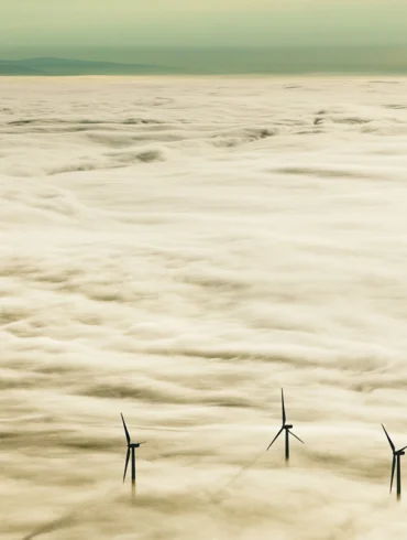 Vinalhaven’s wind farm rises through the clouds. Ralston calls this image Prophets, a nod to “the vision it took on the part of the community to make this extraordinary project happen.”