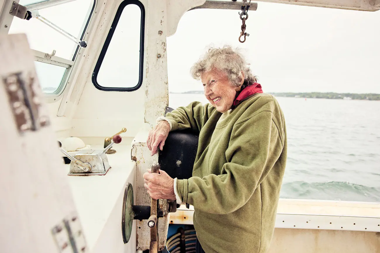 Virginia Oliver, 101, at the helm of her lobsterboat