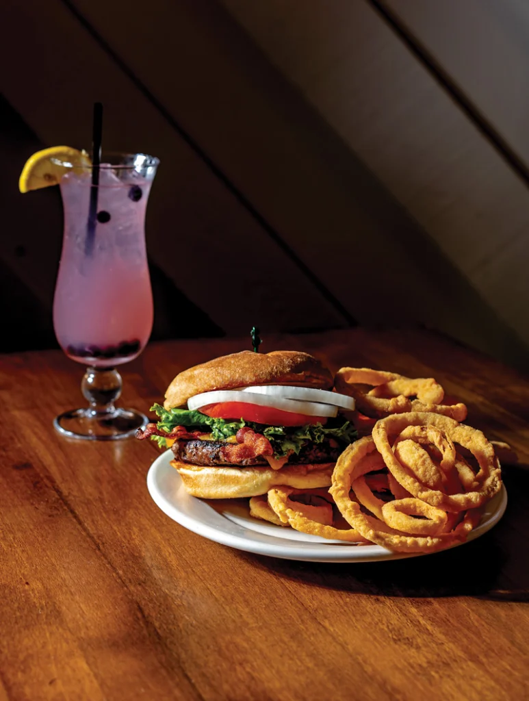 bacon burger with onion rings at Dean's Motor Lodge
