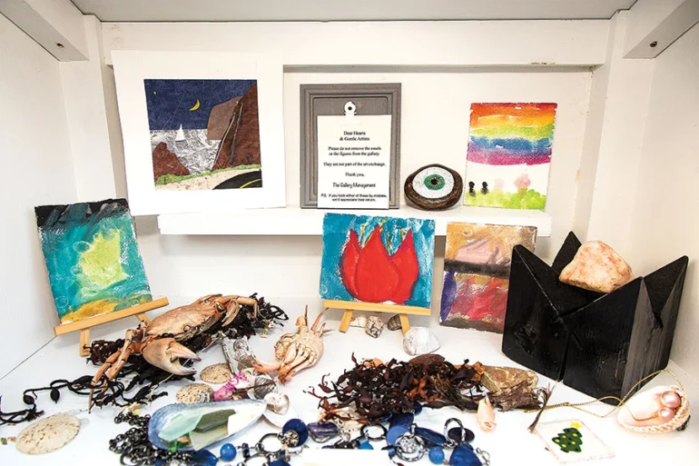 Petite pastels and shrimpy shell-art in Castine’s free little art gallery.