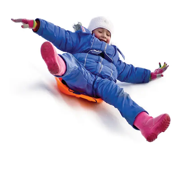 young girl on a sled