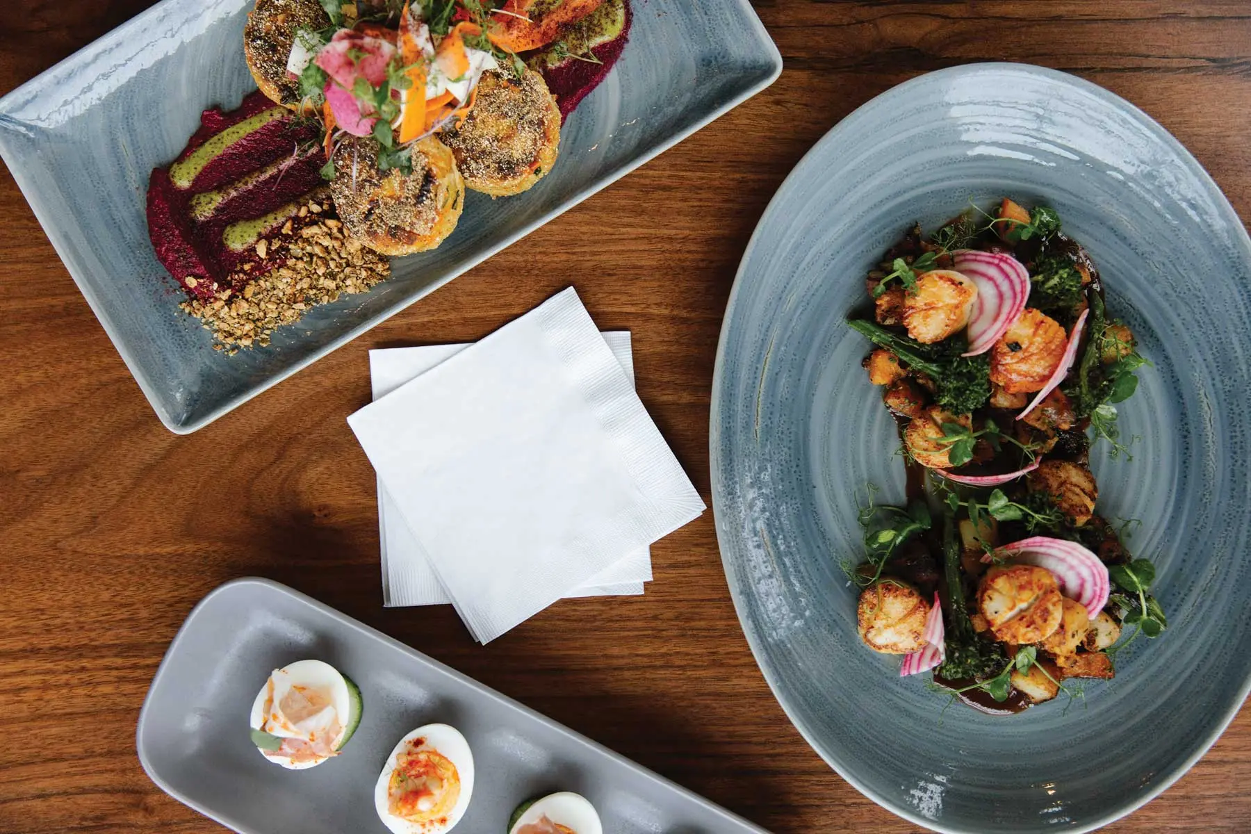 Deviled eggs, veggie cakes with beet hummus, and scallops from Waterville's Front & Main
