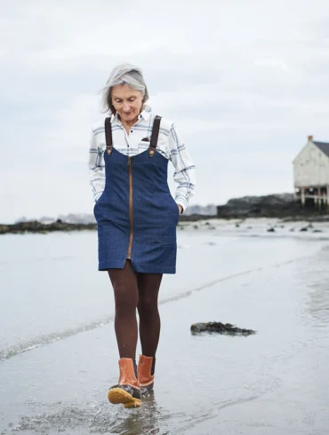 SoPo designer Valerie Beggs modeling the dress from her Woodland Waders line