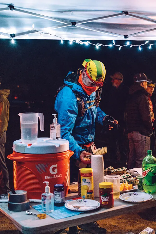 A Riverlands 100 runner at one of the race's aid stations 