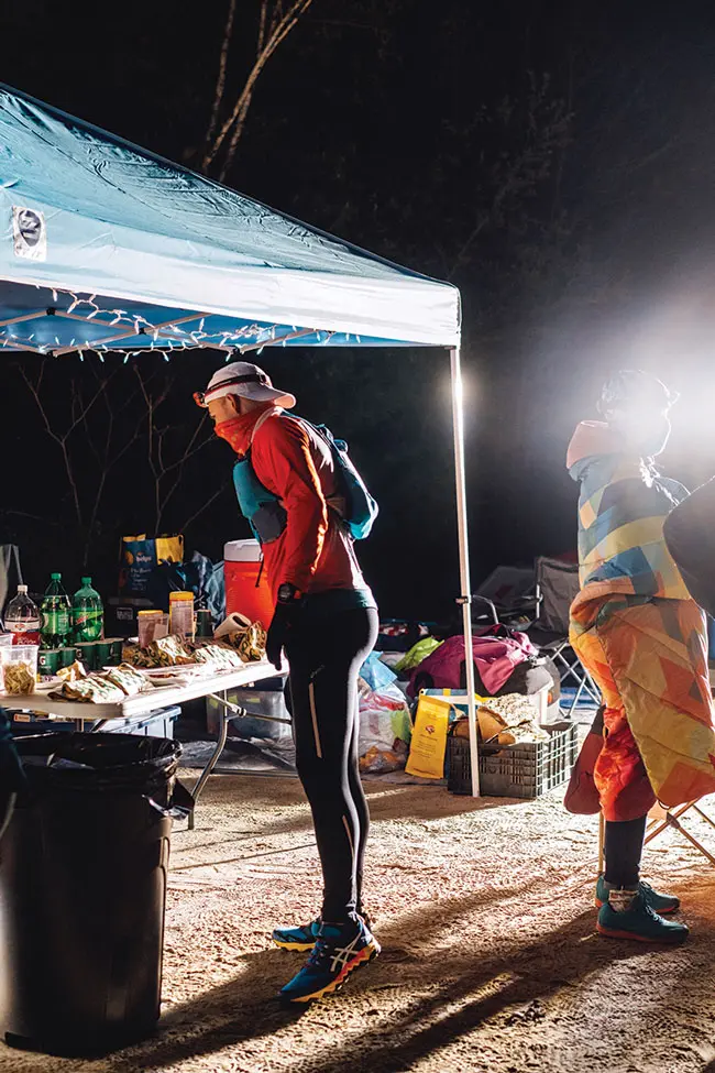 A Riverlands 100 runner at one of the race's aid stations 
