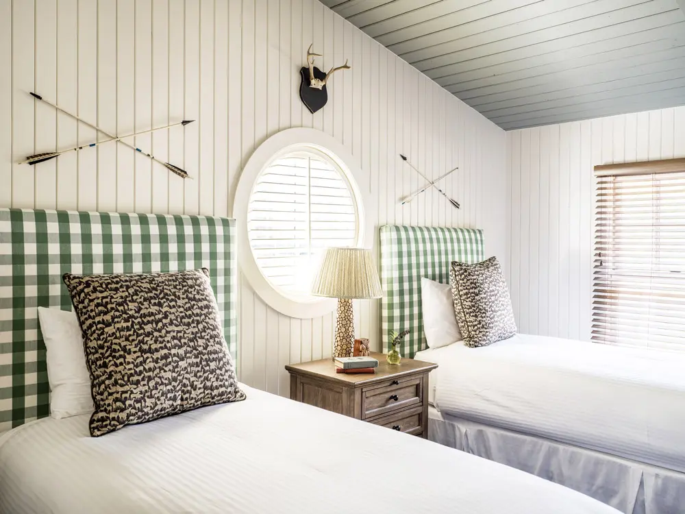 Twin beds in the Morning Glory cottage at The Claremont.