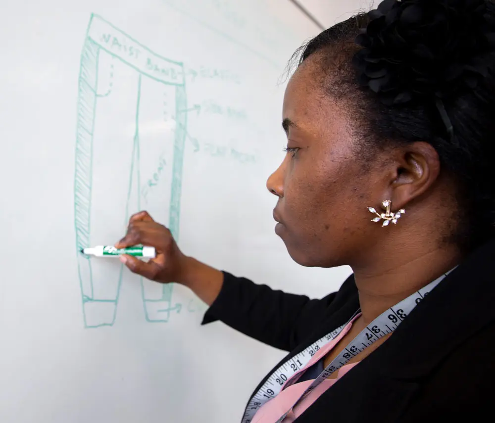 Co-executive director Apphia Kamanda is also the lead sewing instructor.