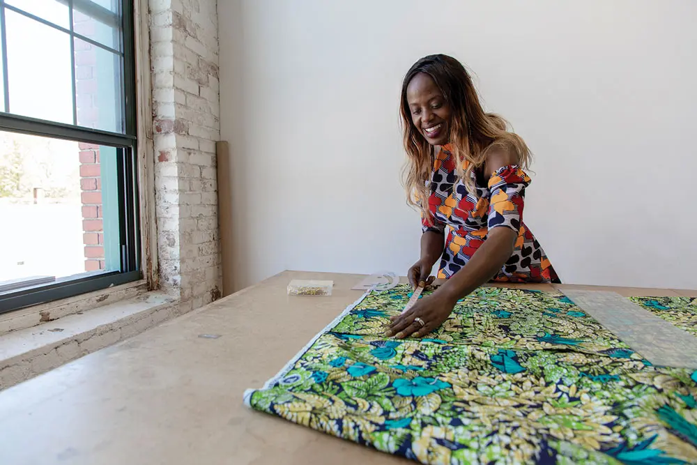 Fellowship recipient Josiane Mutangana, at the mill.