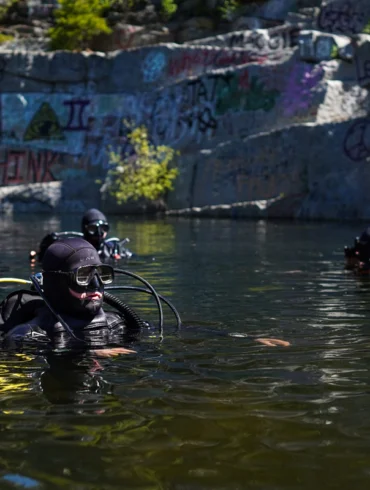 Chip Lagerbom, the diver in the front, is a dive leader and an AP U.S. History teacher.