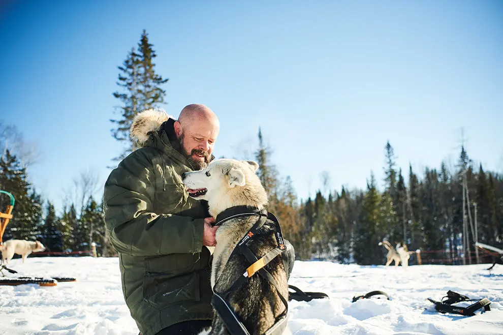 Musher Jonathan Nathaniel Hayes and one of his sleddogs
