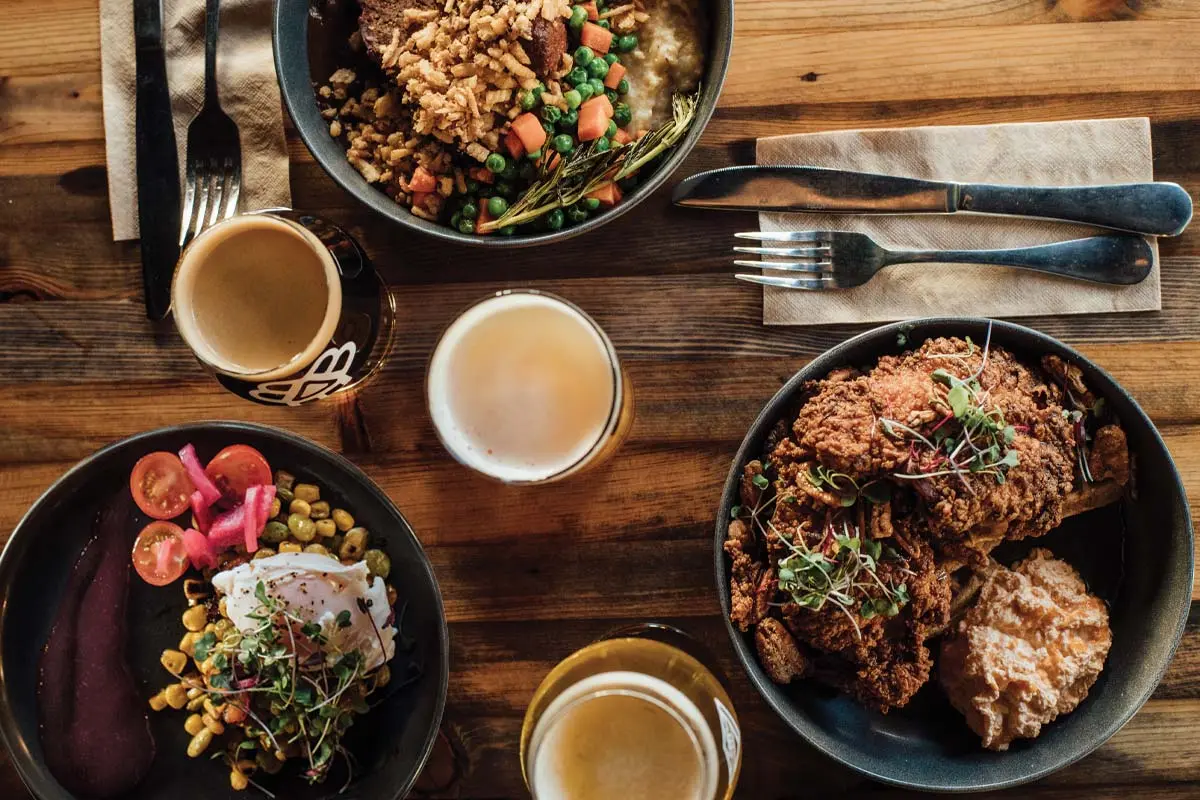 meatloaf; chicken and waffles with buffalo whipped cream; duck-egg-topped succotash from Bissell Brothers Three Rivers