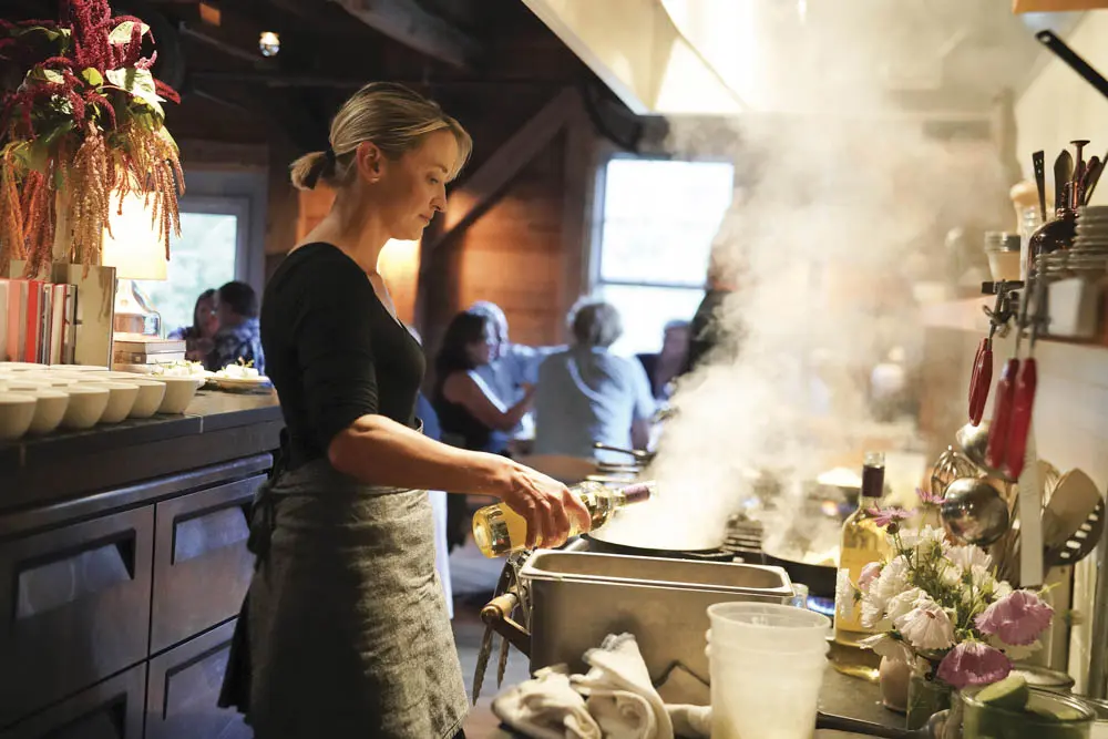 Erin French cooking in The Lost Kitchen TV show