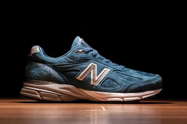 Authentic New Balance 990 V4 USA made (M990NS4) sneakers on a wooden floor